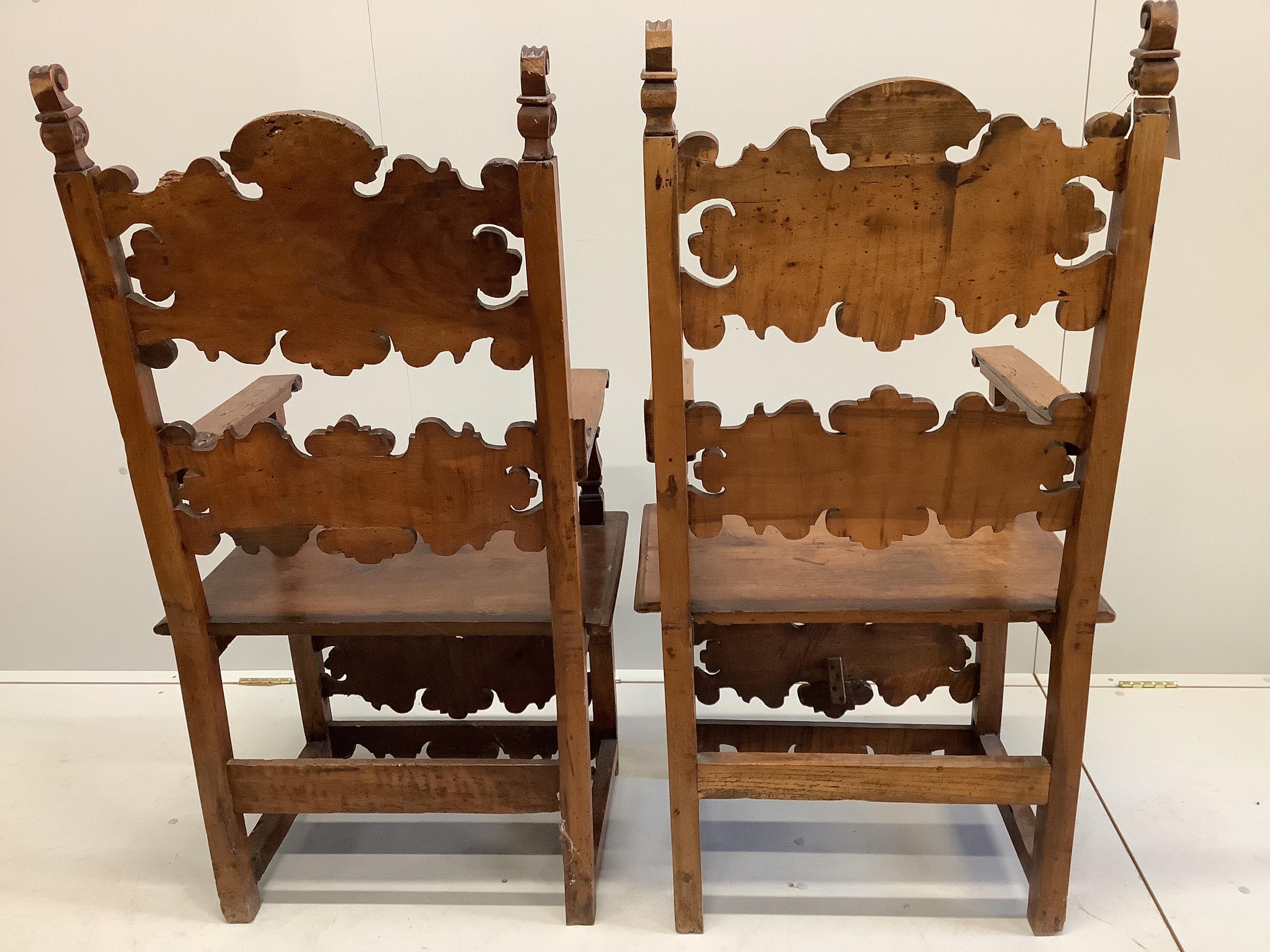 A pair of 18th century style carved inlaid walnut elbow chairs, width 57cm, depth 49cm, height 124cm